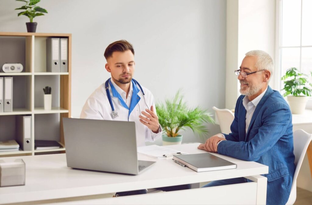 A senior talks to a doctor who specializes in Alzheimer’s to get more resources for support after their diagnosis